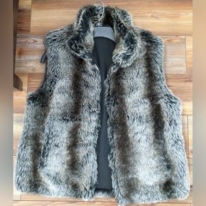 Reversible Faux Fur vest.  Rarely worn.